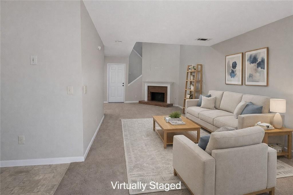 3699 Oakwood Manor Court Decatur, GA 30032 - Photo 2 of 21 a living room with furniture and a fireplace