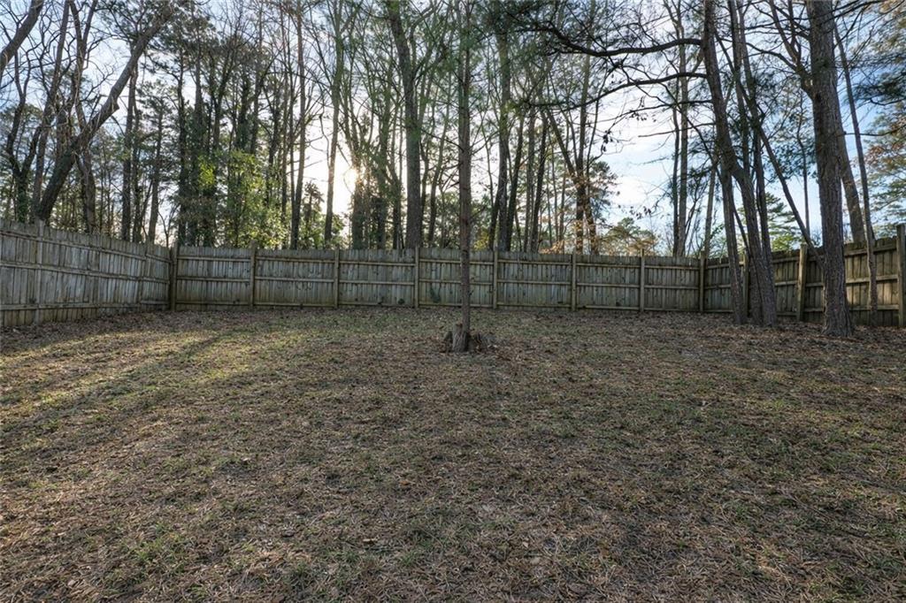 3699 Oakwood Manor Court Decatur, GA 30032 - Photo 21 of 21 a view of outdoor space with wooden fence