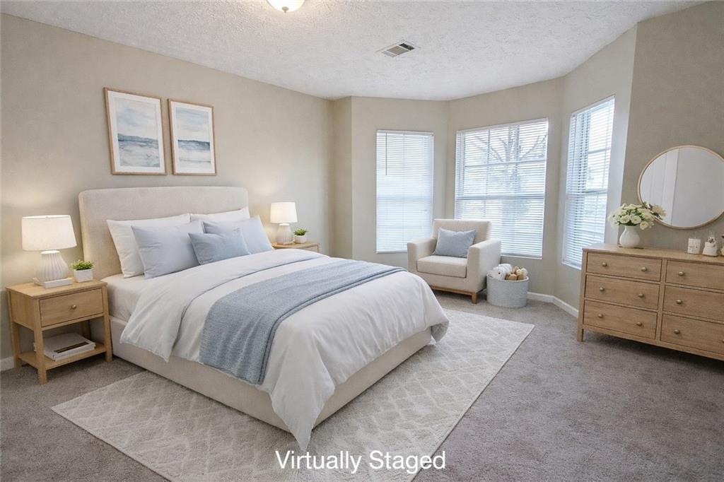 3699 Oakwood Manor Court Decatur, GA 30032 - Photo 7 of 21 a bedroom with a bed and window