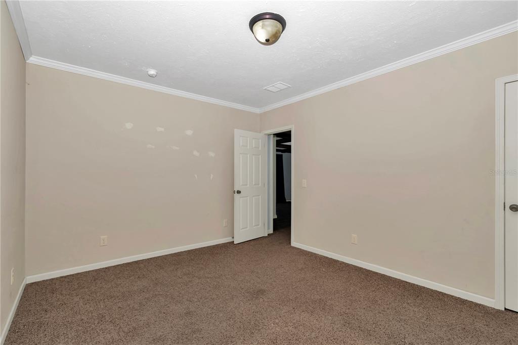 7565 Dewey Robbins Road Howey-in-the-Hills, FL 34737 - Photo 27 of 42 a view of room