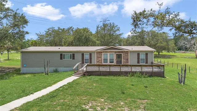 $490,000 | 7565 Dewey Robbins Road, Howey-in-the-Hills, FL 34737
