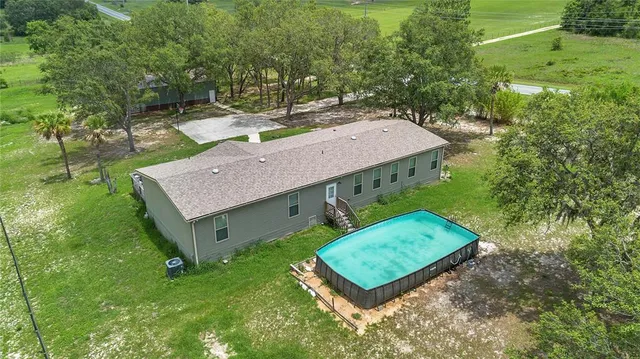 $490,000 | 7565 Dewey Robbins Road, Howey-in-the-Hills, FL 34737