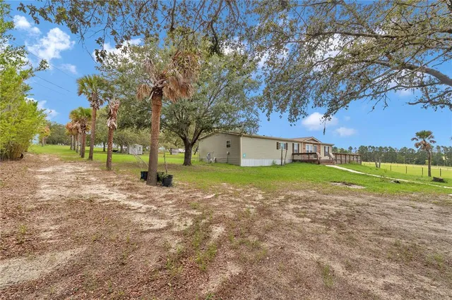 $490,000 | 7565 Dewey Robbins Road, Howey-in-the-Hills, FL 34737