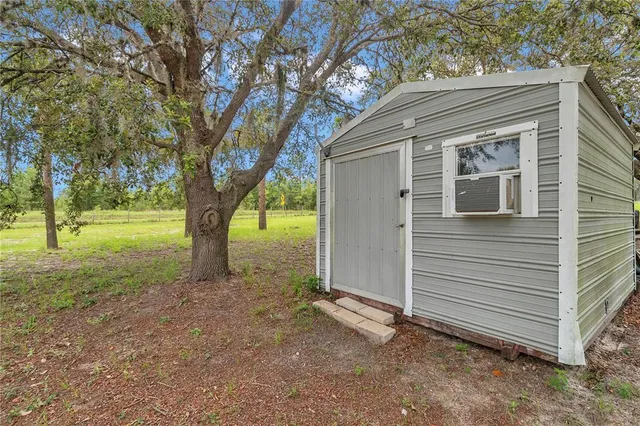 $490,000 | 7565 Dewey Robbins Road, Howey-in-the-Hills, FL 34737
