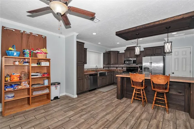 $490,000 | 7565 Dewey Robbins Road, Howey-in-the-Hills, FL 34737