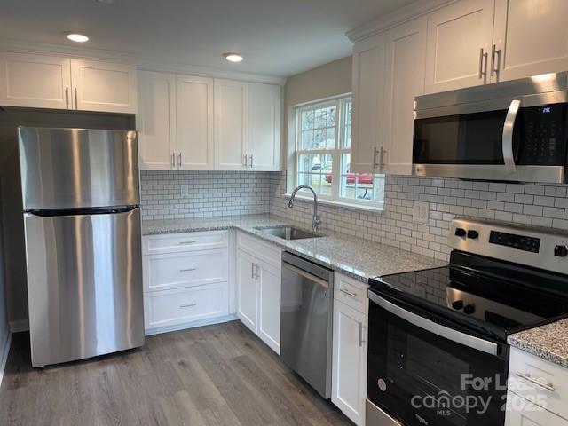 384 Washington Street, Unit 6 Cramerton, NC 28032 - Photo 1 of 10 a kitchen with a refrigerator stove and microwave
