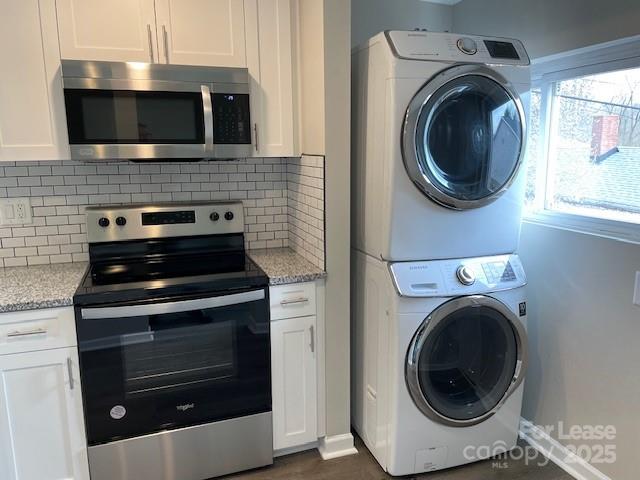 384 Washington Street, Unit 6 Cramerton, NC 28032 - Photo 2 of 10 a view of kitchen with a washer and dryer