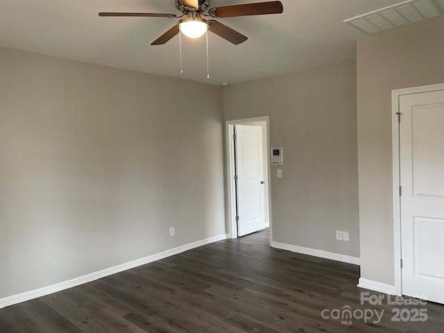 384 Washington Street, Unit 6 Cramerton, NC 28032 - Photo 3 of 10 a view of an empty room with wooden floor