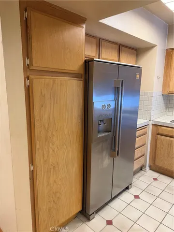 a kitchen with stainless steel appliances a stove a sink and a microwave