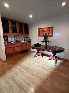 a living room with furniture and a chair