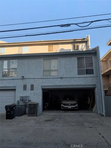 a living room with furniture a fireplace and a fireplace