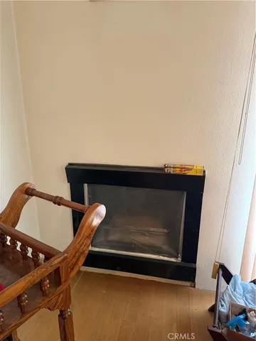 a room with furniture and a potted plant