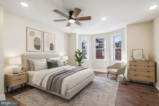 a bedroom with a bed and furniture