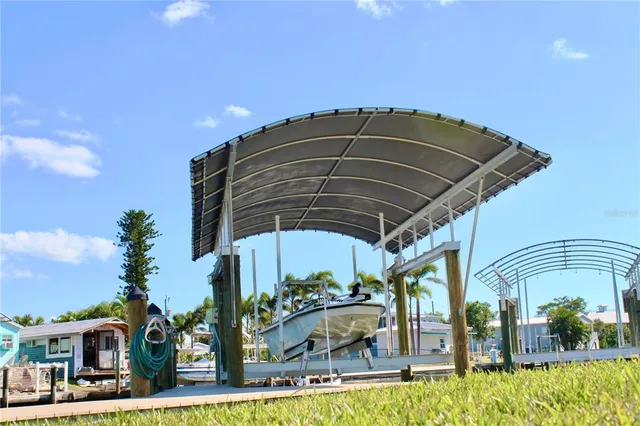 a bedroom with a bed and a lamp