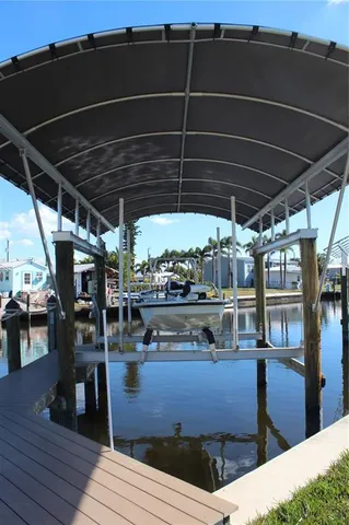 a front view of a house with a garden and yard