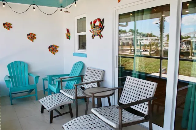 a view of a swimming pool with a patio