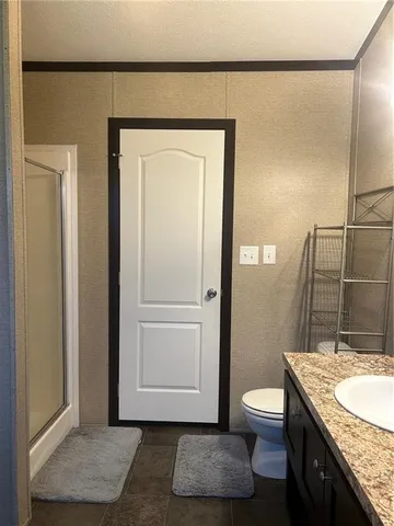 a bathroom with a tub and sink