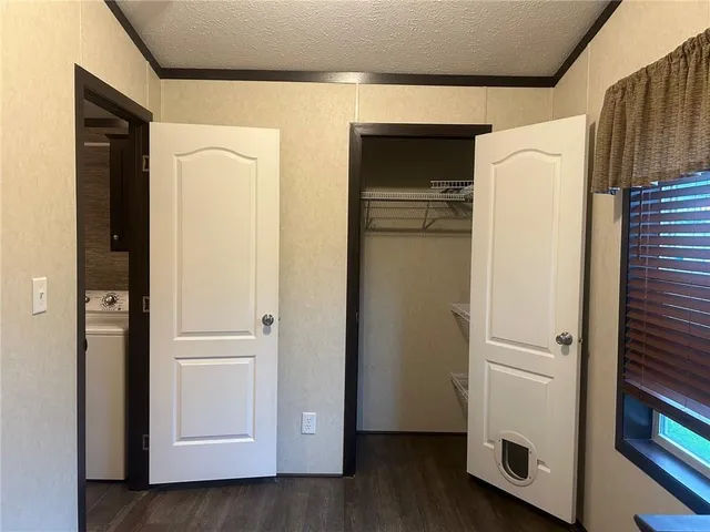 a room with a table and a window