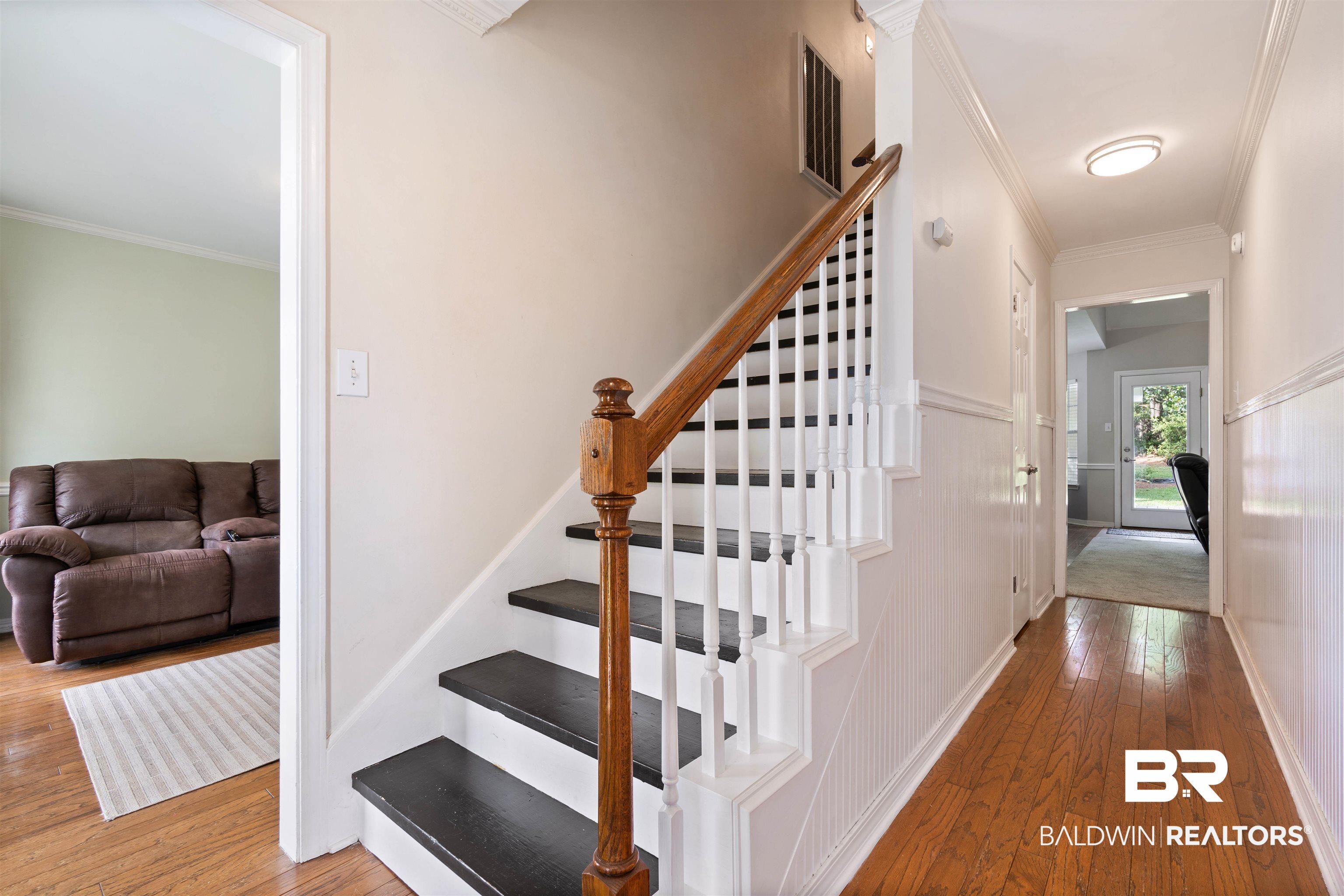 6457 Double Tree Court Mobile, AL 36695 - Photo 32 of 37 Staircase with ornamental molding and hardwood / wood-style flooring