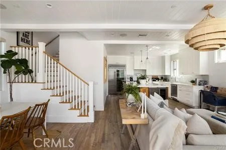 a kitchen with a white stove top oven and white cabinets