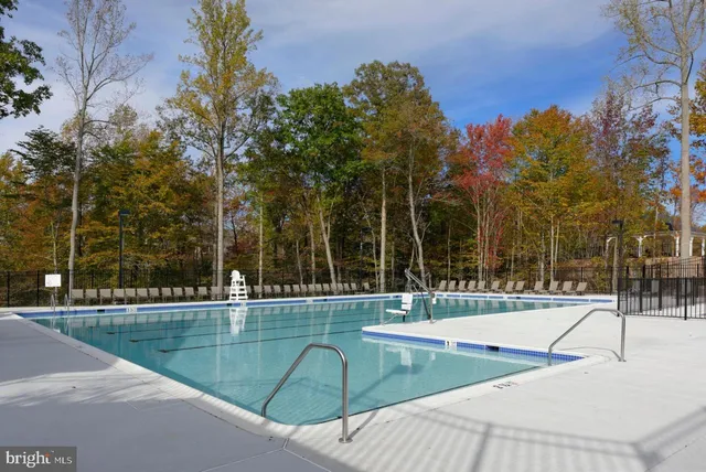 a view of a swimming pool with a patio