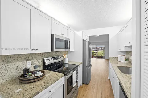 $245,000 | 1401 Southwest 128th Terrace, Unit 103H, Pembroke Pines, FL 33027