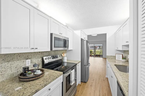 $245,000 | 1401 Southwest 128th Terrace, Unit 103H, Pembroke Pines, FL 33027