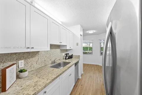 $245,000 | 1401 Southwest 128th Terrace, Unit 103H, Pembroke Pines, FL 33027
