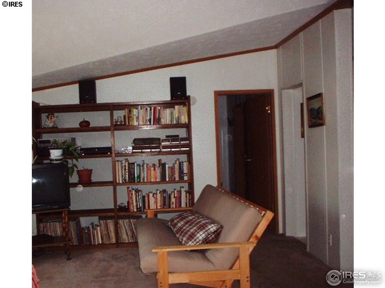 108 East Douglas Road Fort Collins, CO 80524 - Photo 5 of 12 a room with furniture cabinets and window