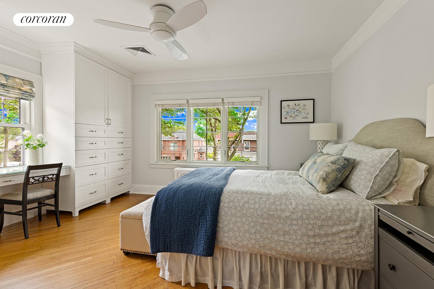 7709 Colonial Road Brooklyn, NY 11209 - Photo 7 of 13 a bedroom with a bed and wooden floor