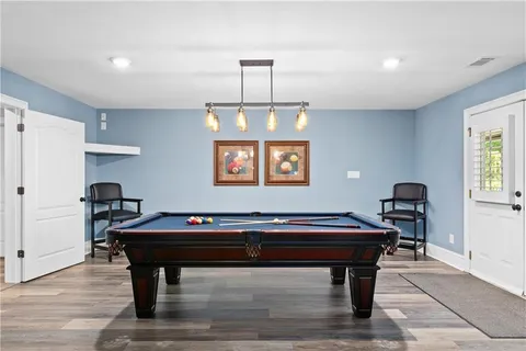 a view of a lake with a yard