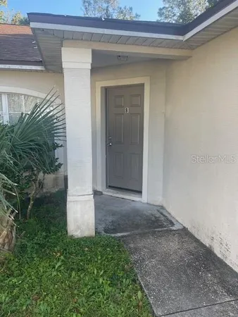 a view of entrance gate of a house