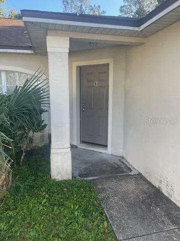 a view of entrance gate of a house