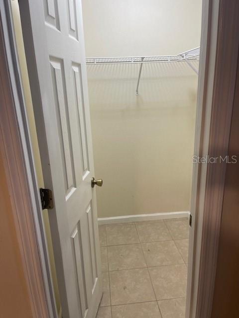 38 Pine Hurst Lane, Unit B Palm Coast, FL 32164 - Photo 6 of 11 a bathroom with a shower and a glass door