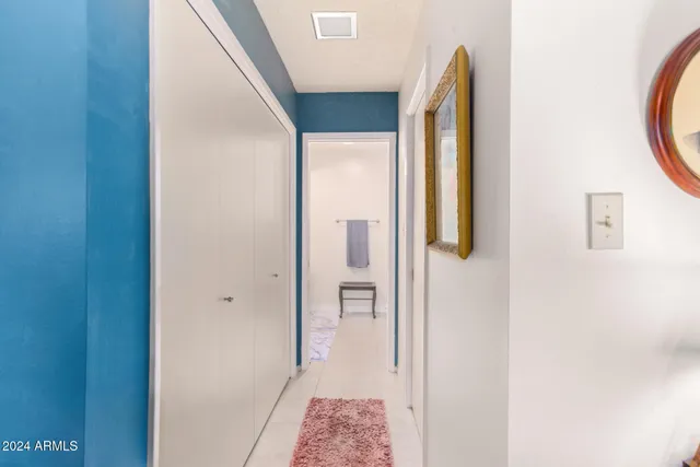 a view of walk in closet with window