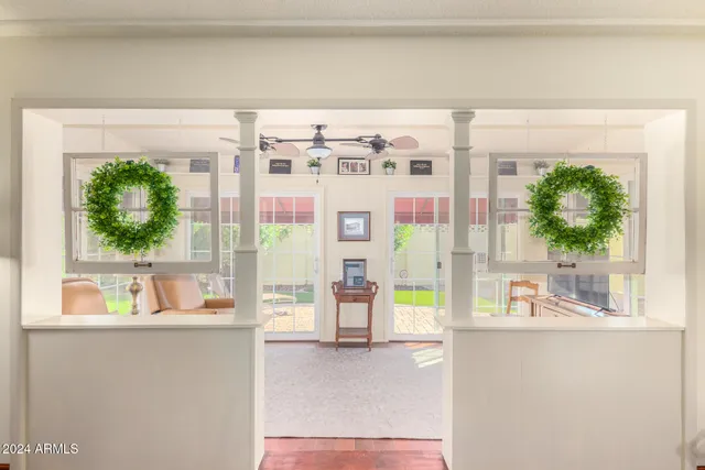 a view of kitchen with furniture and large window