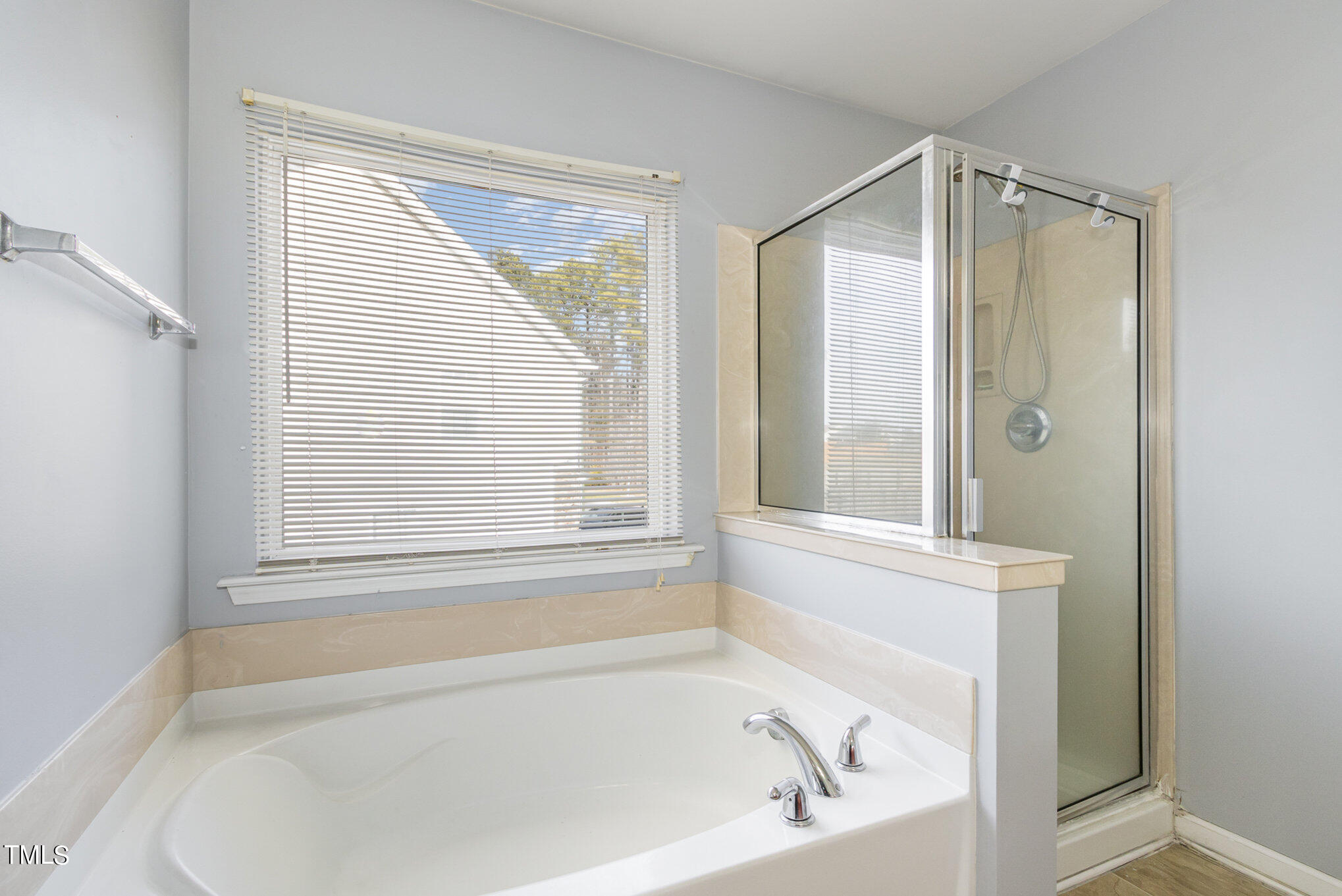 650 Conover Road Durham, NC 27703 - Photo 21 of 25 a bathroom with a bathtub and a shower