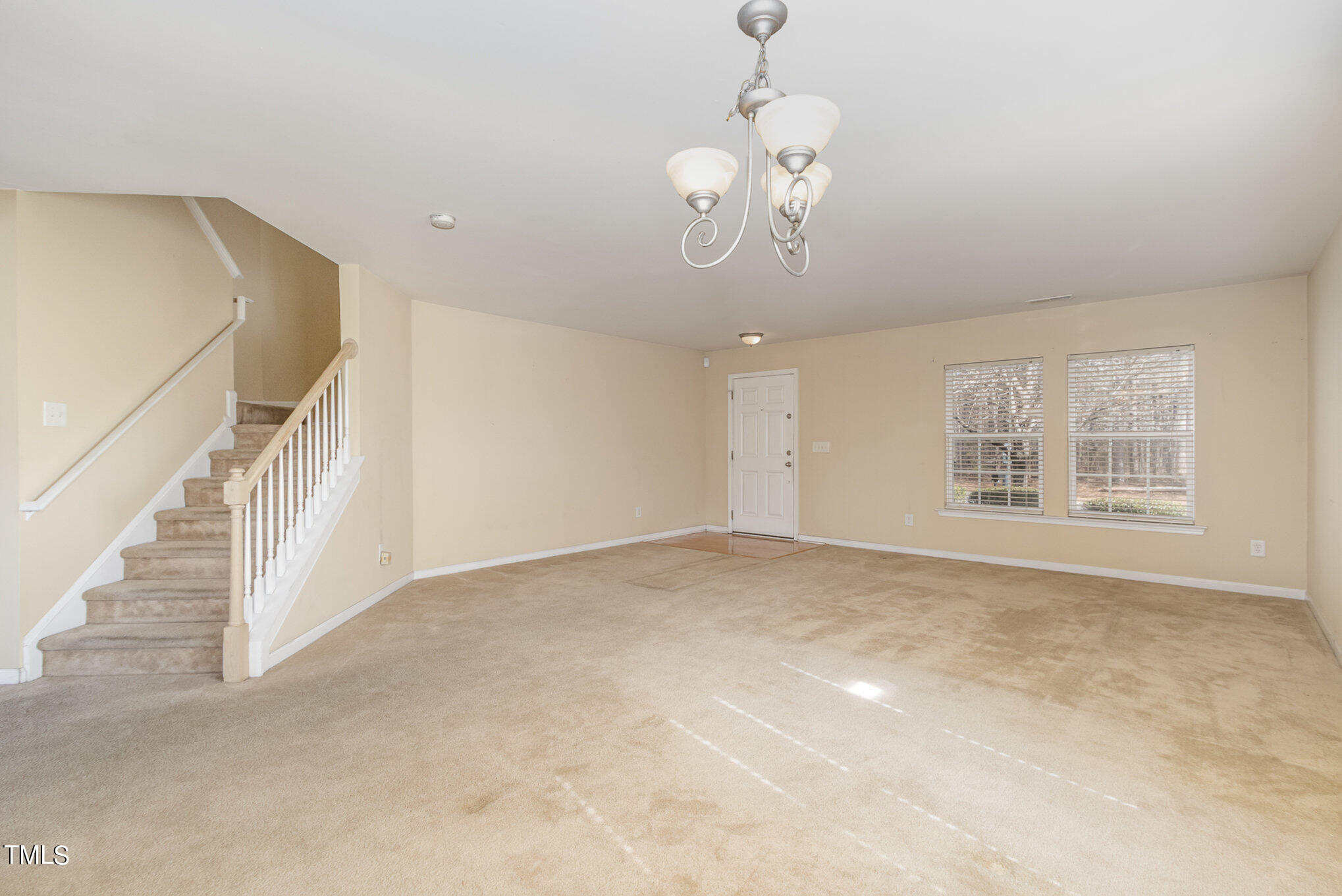 650 Conover Road Durham, NC 27703 - Photo 6 of 25 a view of an empty room with a window