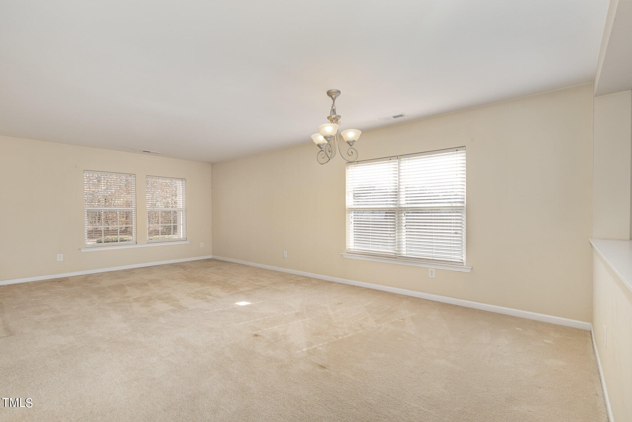 650 Conover Road Durham, NC 27703 - Photo 7 of 25 an empty room with a window
