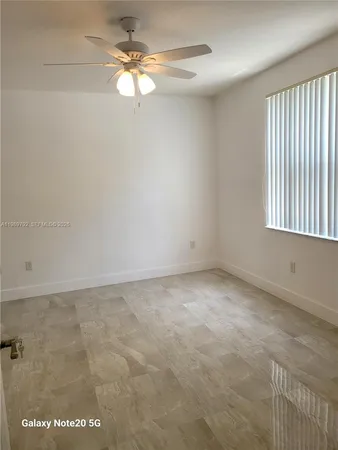 a view of a livingroom with a fan