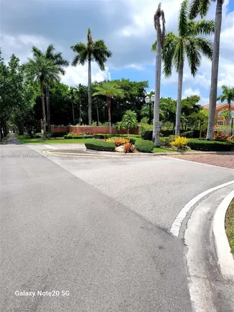 a bathroom with a bath tub with a shower