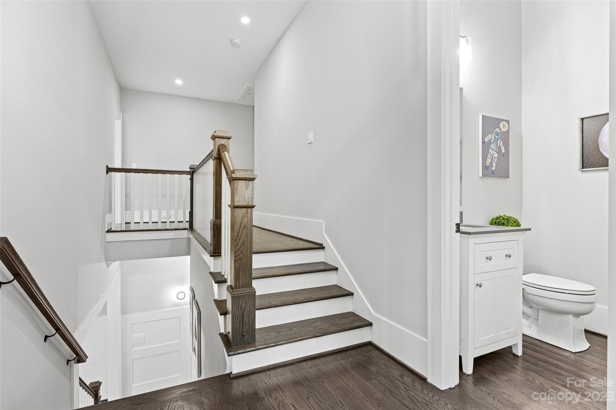 5524 Closeburn Road Charlotte, NC 28210 - Photo 25 of 44 a view of entryway with stairs and wooden floor