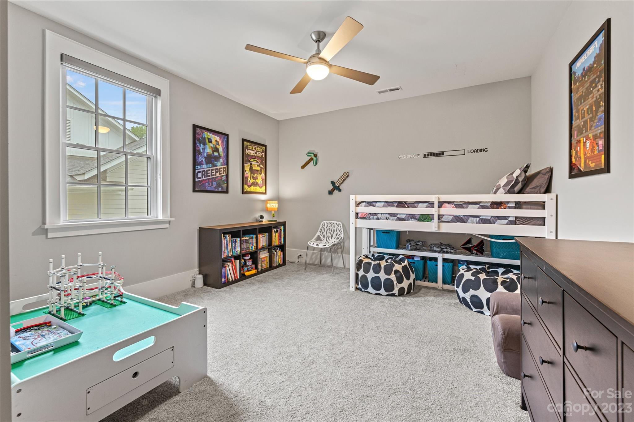 5524 Closeburn Road Charlotte, NC 28210 - Photo 31 of 44 a living room with furniture and a baby crib
