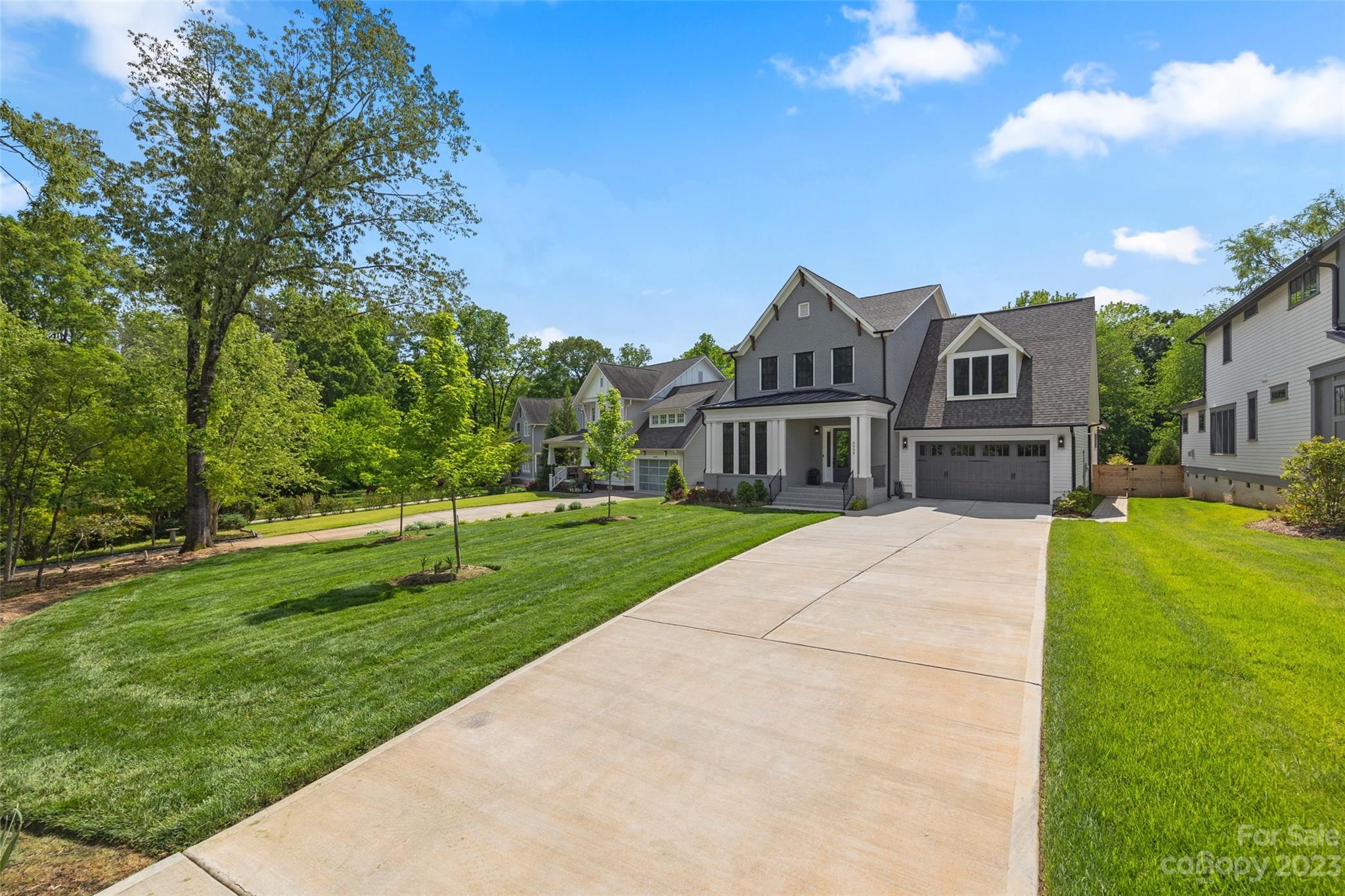 5524 Closeburn Road Charlotte, NC 28210 - Photo 36 of 44 a front view of a house with a yard