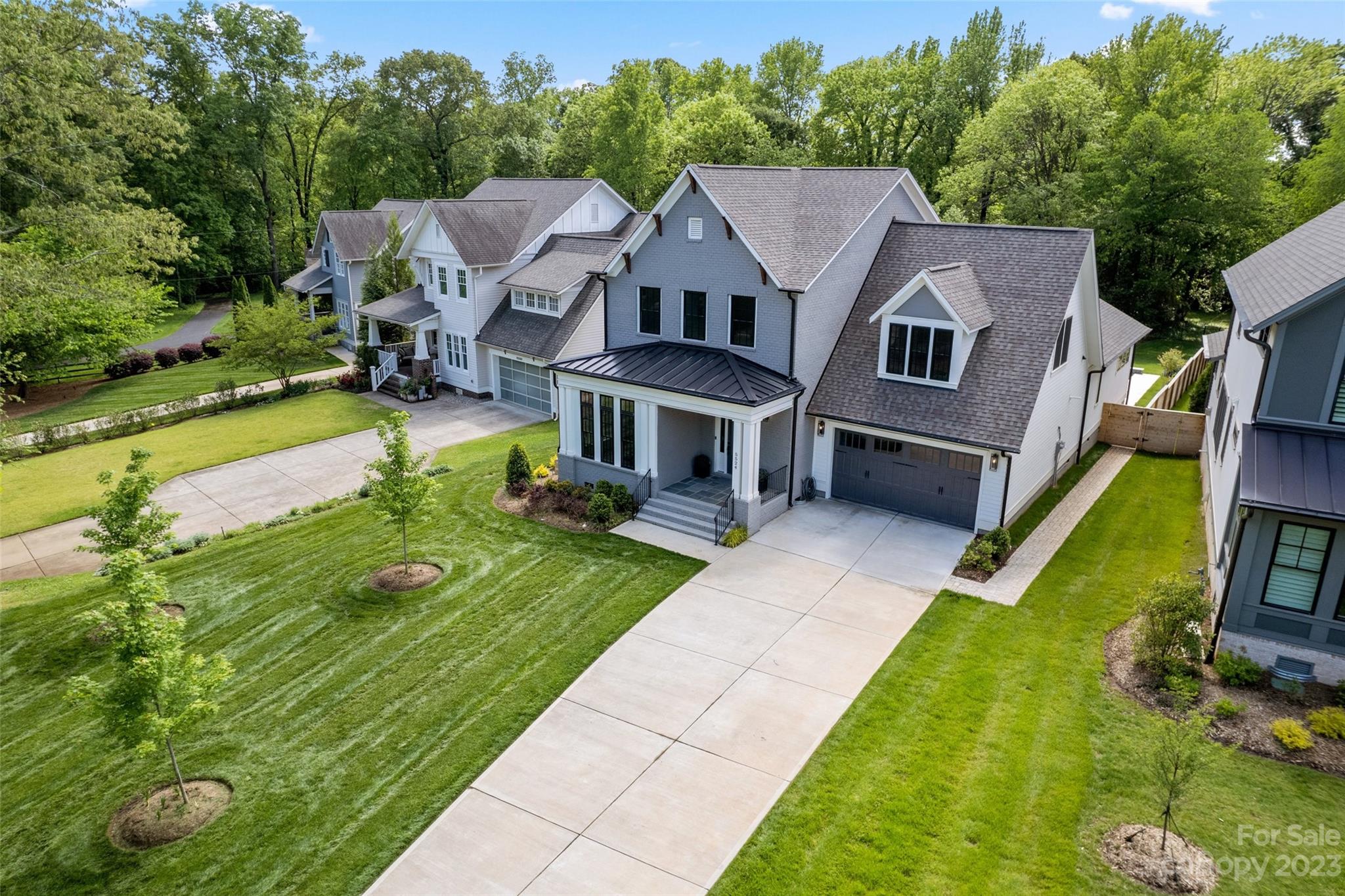 5524 Closeburn Road Charlotte, NC 28210 - Photo 4 of 44 a aerial view of a house with swimming pool garden and patio