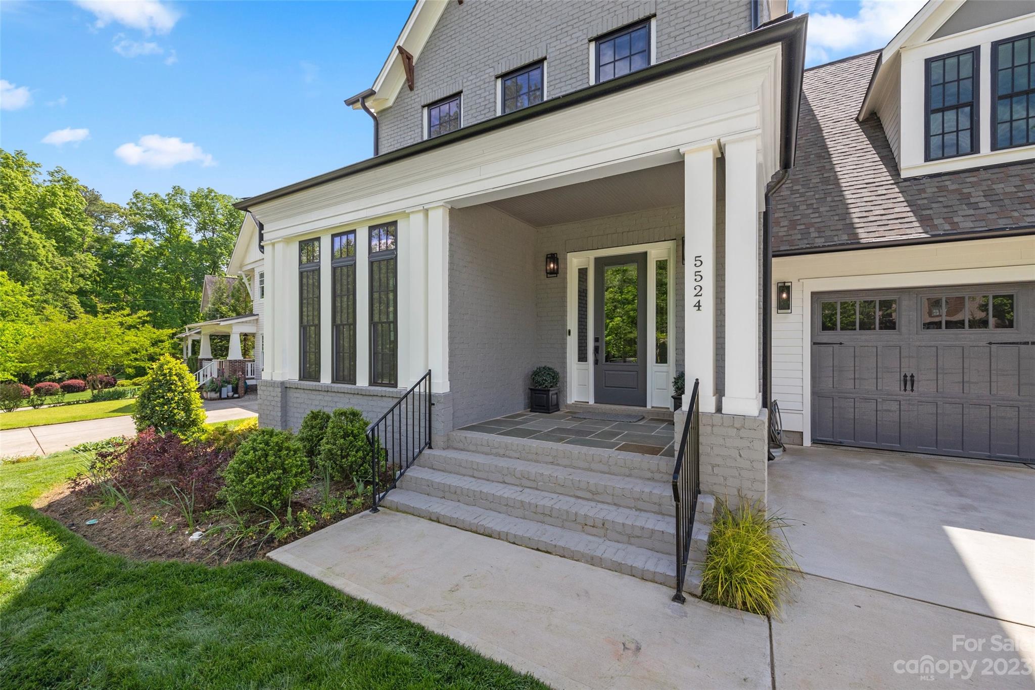 5524 Closeburn Road Charlotte, NC 28210 - Photo 5 of 44 front view of a house with a yard