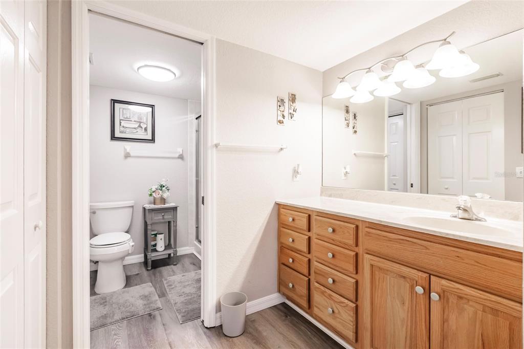 175 Kings Highway, Unit 538 Punta Gorda, FL 33983 - Photo 21 of 46 a spacious bathroom with a sink and a mirror