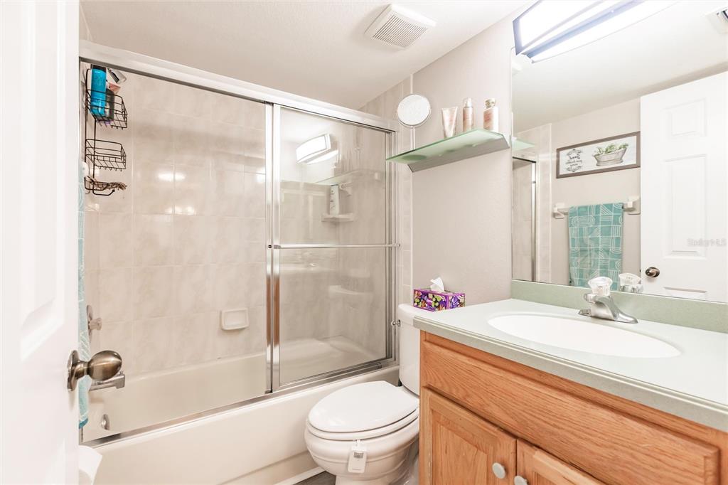 175 Kings Highway, Unit 538 Punta Gorda, FL 33983 - Photo 27 of 46 a bathroom with a sink toilet tub and shower
