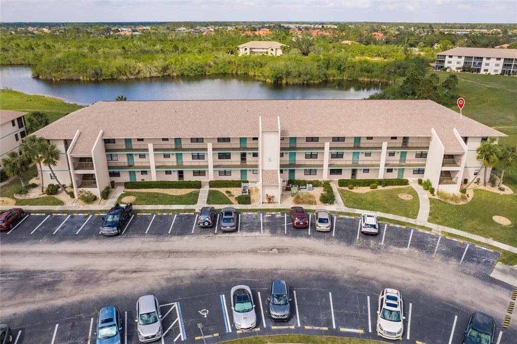 175 Kings Highway, Unit 538 Punta Gorda, FL 33983 - Photo 34 of 46 an aerial view of a house with a lake view