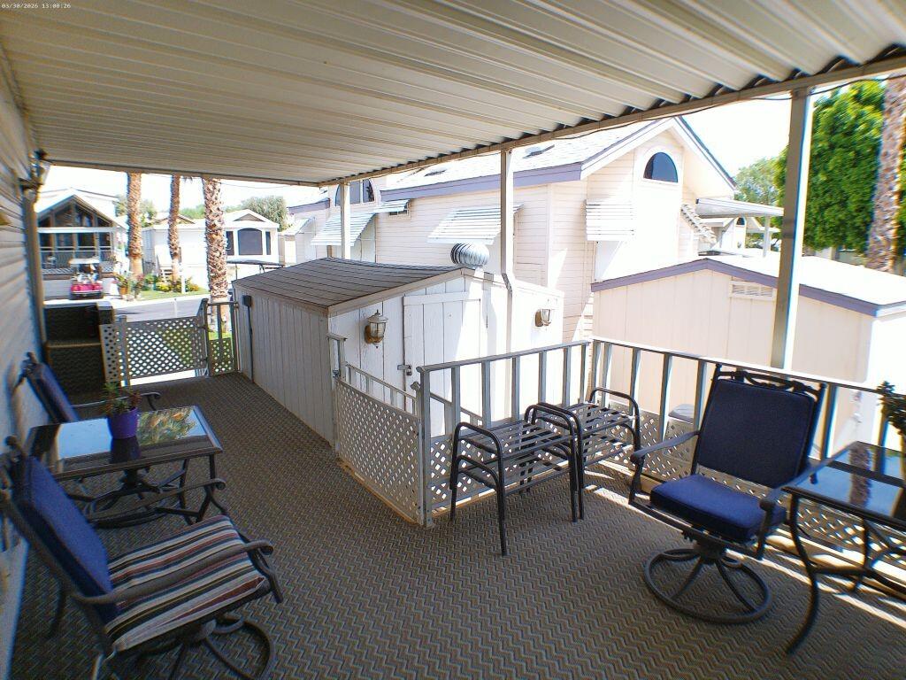 84136 Ave 44, Unit 582 Indio, CA 92203 - Photo 12 of 56 a view of a chairs on the roof deck